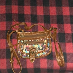 Claire’s owl purse